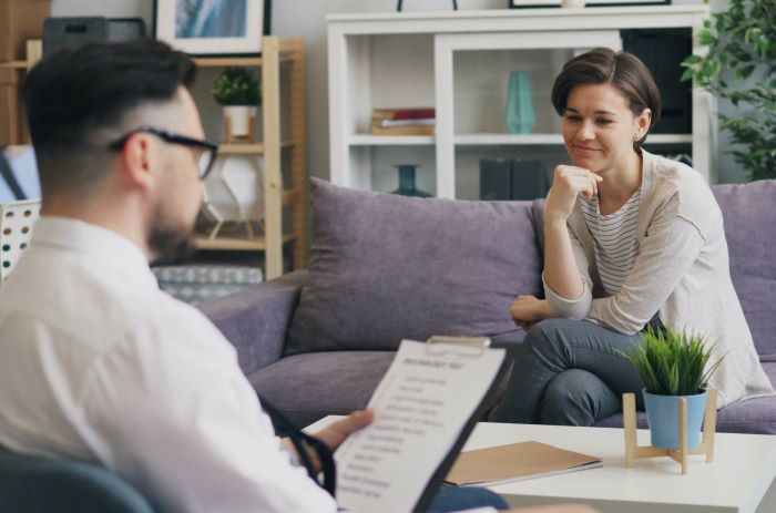 illustrated man and a women having a conversation in an office environment